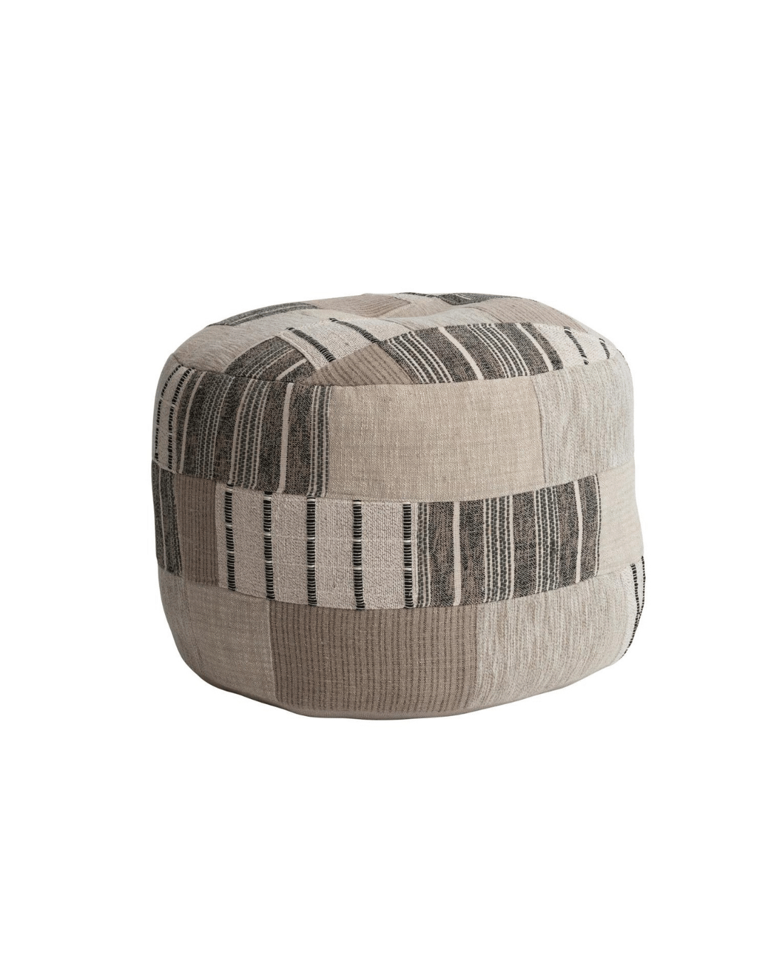 A Slub Patchwork Pouf, Neutral  24" Round x 18"H with a patchwork design in shades of beige, cream, and gray. The fabric features various striped and textured patterns, creating a visually interesting piece of furniture. This multi-color ottoman by Creative Co-op exudes cozy, rustic artisanal charm.