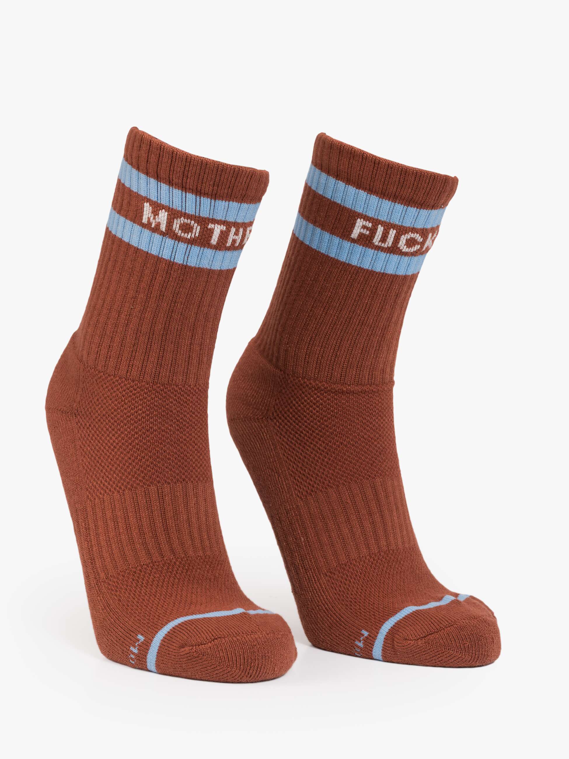 Blue-striped tube socks with bold cuff text by Mother, style Baby Steps, set on a clean white background.
