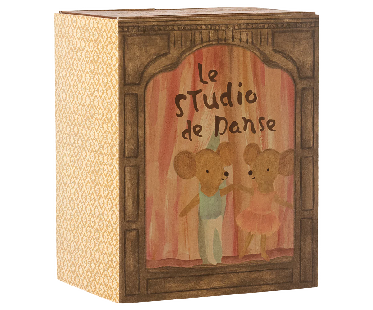 The Maileg Ballet Mice / Little Sis & Bro box by Maileg features two ballet mice on stage under "le Studio de Danse," with pink curtains and a patterned side panel—ideal as a charming ballet playset or mouse house.