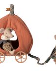 The Maileg Pumpkin Carriage by Maileg features two royal mice—one pulling a plush pumpkin carriage while the other rides inside—bringing fairytale adventures to life and making it a magical addition to any castle playset.