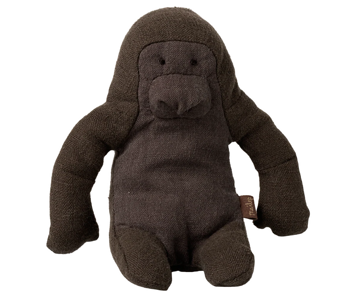 A soft, brown Maileg Mouse plush toy with simple stitched features and floppy arms and legs, sitting upright—a charming companion that perfectly matches your Maileg collection.