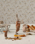Maileg Broom Set with bunnies in cozy autumn outfits sweeping leaves, styled by Bungalow Furniture & Accessories.