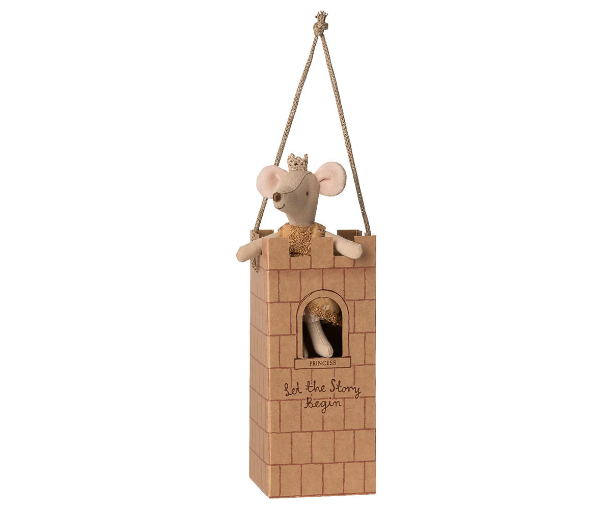 The Maileg Royal Mouse by Maileg wears a crown and sits in a castle-themed cardboard tower with "Let the Story Begin" on the front, hanging from two ropes.
