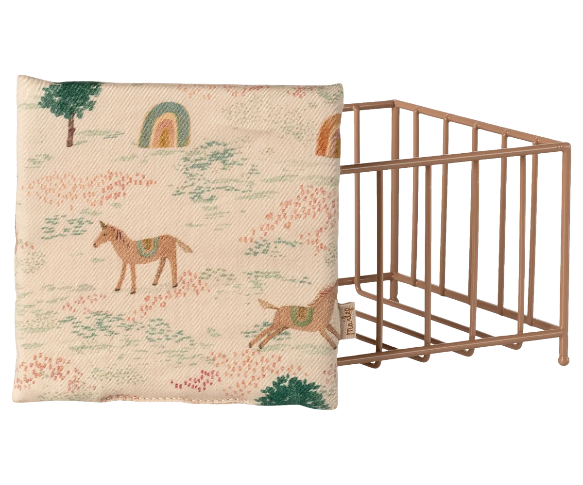 Metal wire mini playpen with whimsical horse cushion by Maileg, features rainbows and trees for playful décor.