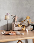 Maileg Coffee Table Miniature styled with toy tea set and plush bunnies, cozy playtime scene by Maileg.