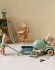 Maileg mice play with a Maileg Car and pull-along wagon in a whimsical room styled with charming accessories.