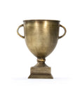The Zentique G132411 Camille Trophy in antique gold features two handles and a square base, making it a stylish accent or home decor piece. Displayed against a white background for an elegant touch.