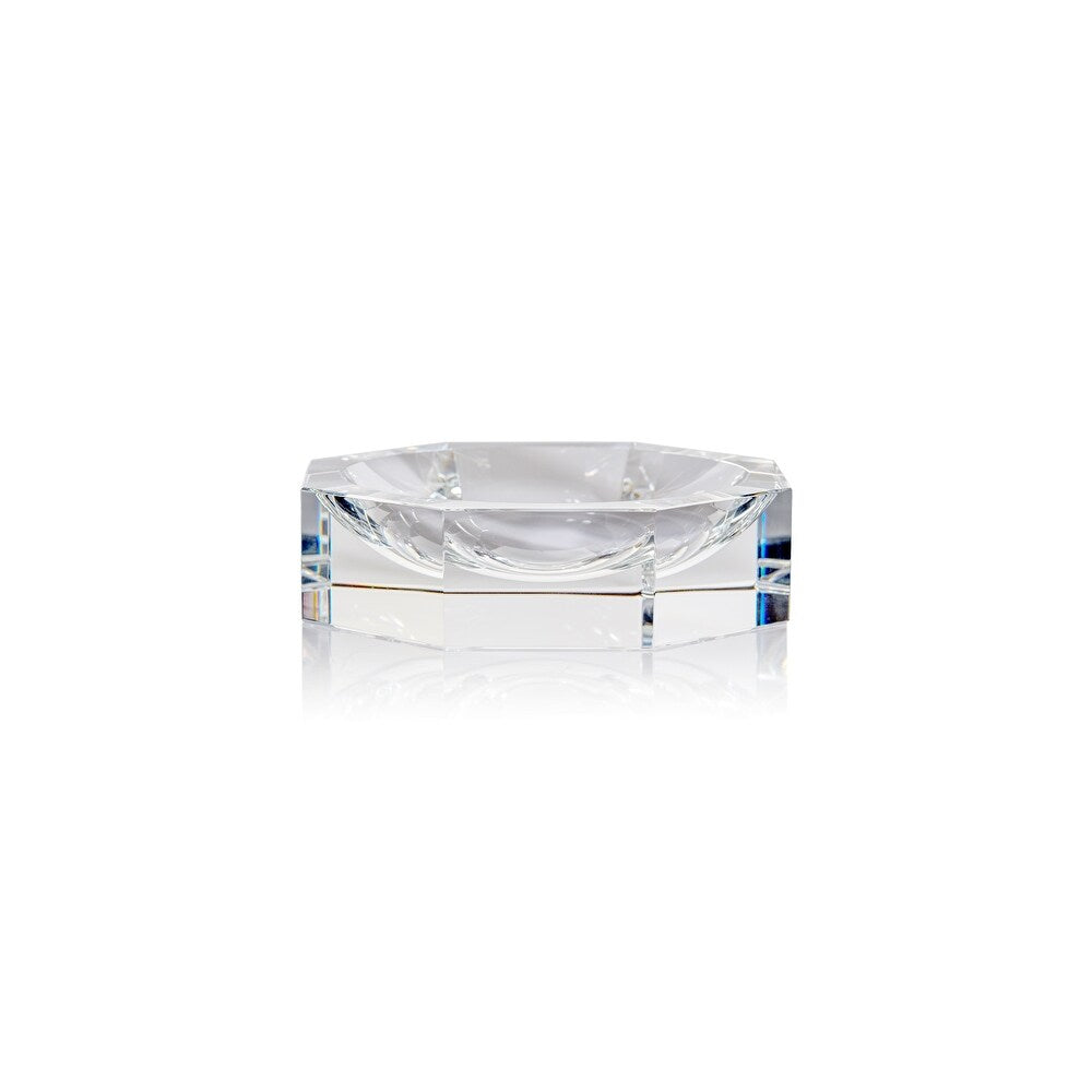 The Zodax Octagon Bowl features a clear, faceted glass design with geometric octagonal edges and a round basin, photographed on a white background with a subtle reflection.