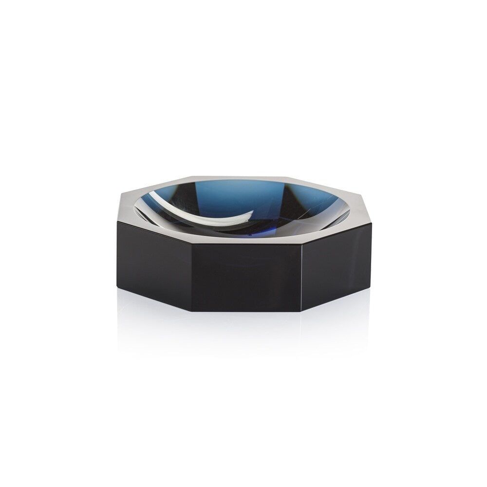 The Zodax Crystal Octagon Bowl features a geometric, faceted design with a deep blue-tinted interior and black exterior, displayed against a white background.