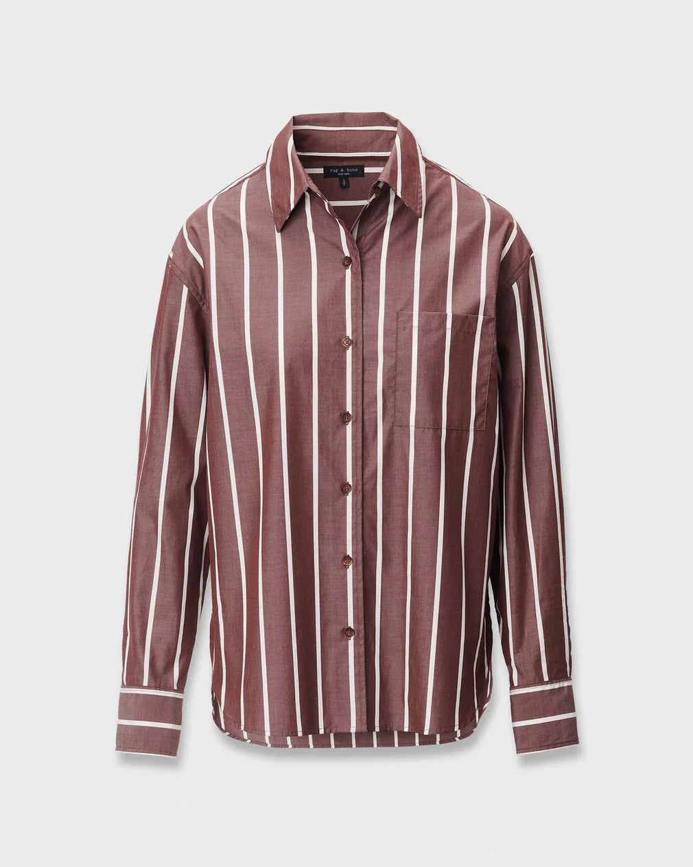 The Rag & Bone connie striped shirt offers a relaxed fit in cotton poplin, with long sleeves, button-up front, maroon fabric with vertical white stripes, and finished with a collar and front pocket.