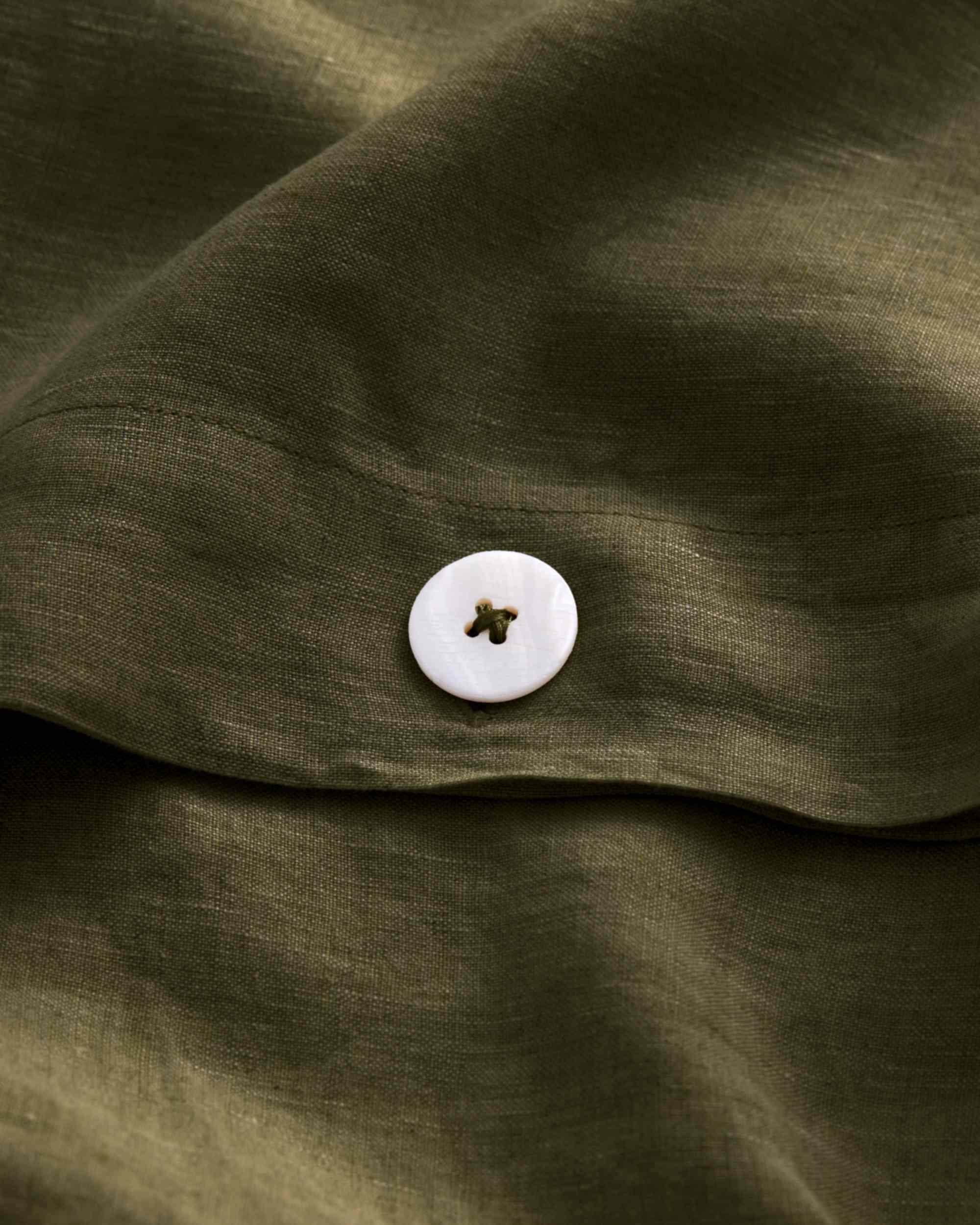 Olive green linen duvet cover with white button detail, Cultiver Goods USA, European flax.