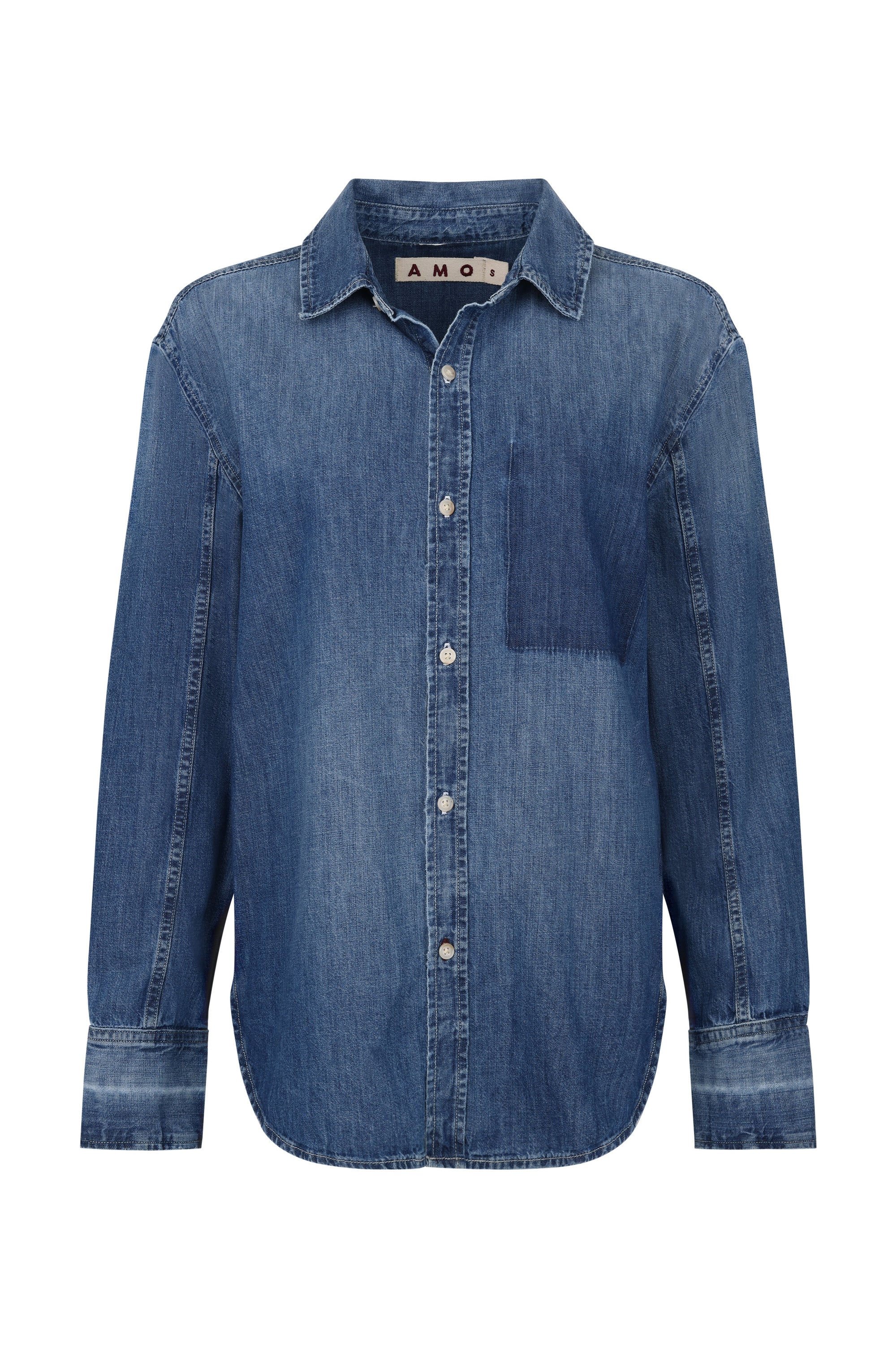 The Ruth Oversized Shirt by AMO Denim is a blue vintage wash denim button-up with long sleeves, a collar, single chest pocket, visible seams, and silver front buttons for a timeless look.