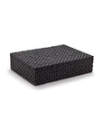 The DGJ144 Nomad BOX by Two's Company is a rectangular, black handmade storage box with a flat lid, displayed against a white background. Its interlaced texture lends this sturdy box a modern, elegant look.