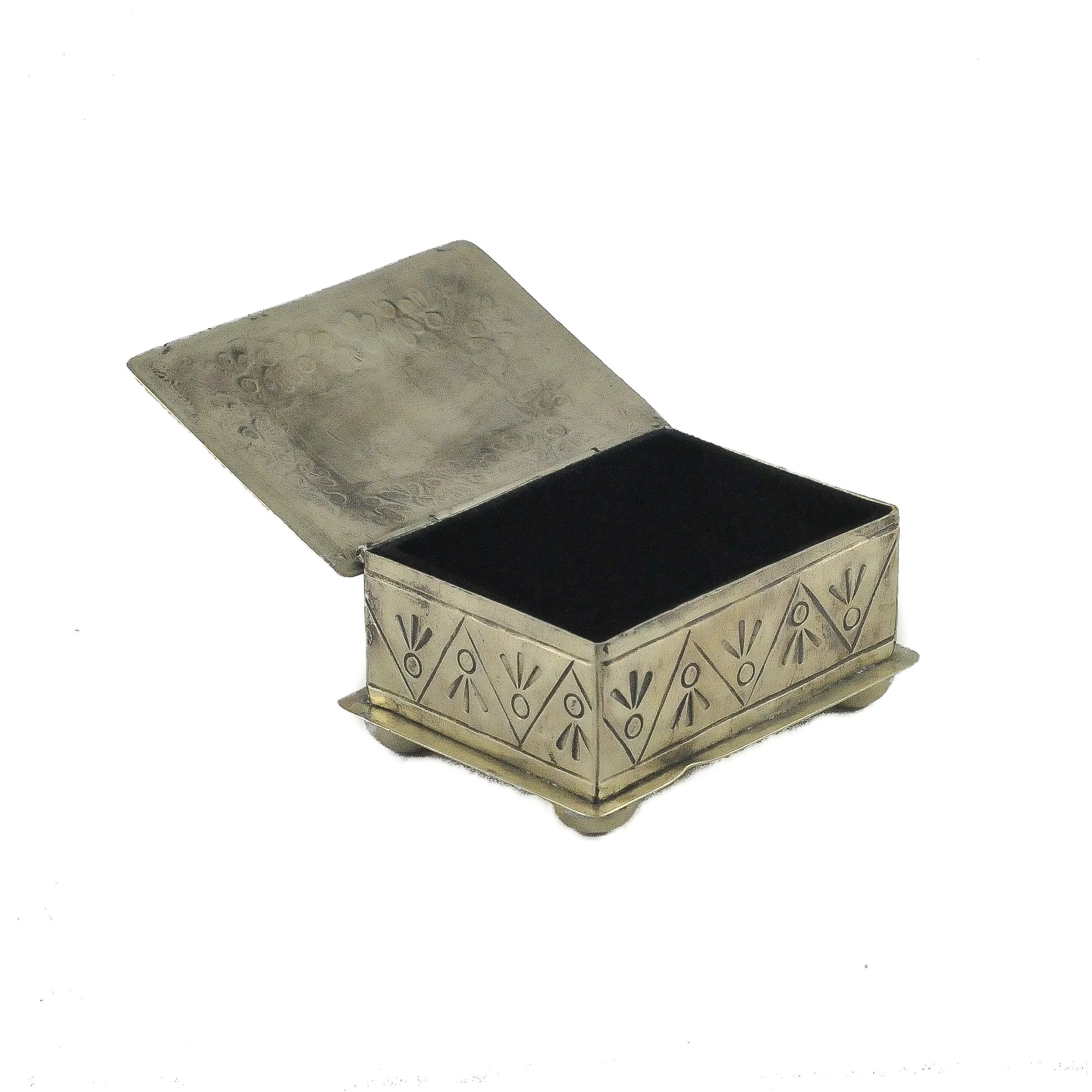 The J Alexander Rustic Silver 15-4-T Small Stamped Box w/ Turquoise is a rectangular, rustic silver box with engraved sides, open hinged lid, turquoise accent, and rounded feet—ideal for Southwestern home decor. Interior is dark and empty.