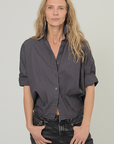 Monday12 Daria Shirt styled with jeans; casual look on model with wavy blonde hair, light background.