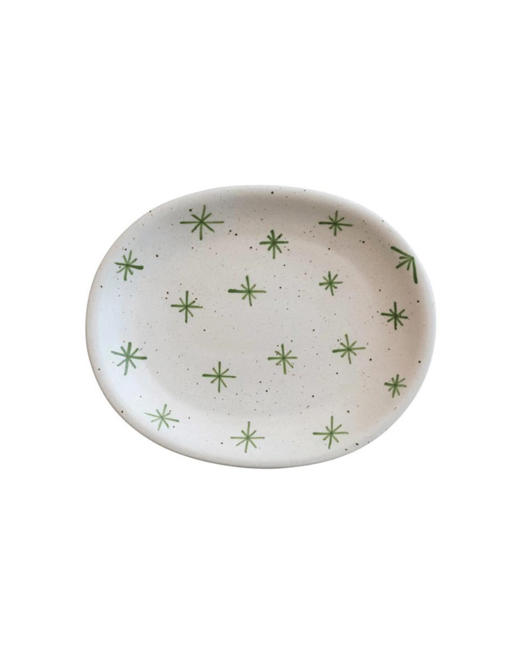 The Oval Tray Antique Brass by Creative Co-op features a simplistic, minimalistic design with an oval-shaped white surface dotted with delicate speckled patterns and adorned with green starburst accents, adding a decorative touch to any celestial dining experience.