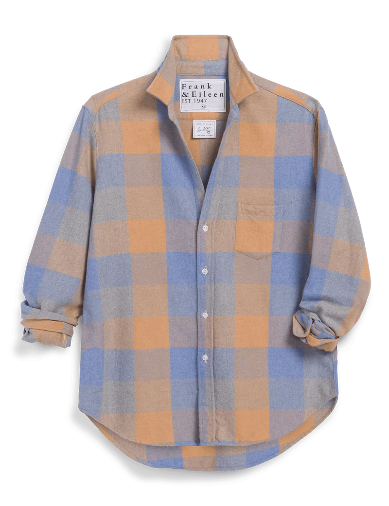The Eileen Button Up Shirt F25 by Frank & Eileen is a relaxed fit, long-sleeve shirt with bust-flattering button placement, large plaid in tan, blue, and light gray, rolled sleeves, and a single chest pocket for casual California style.