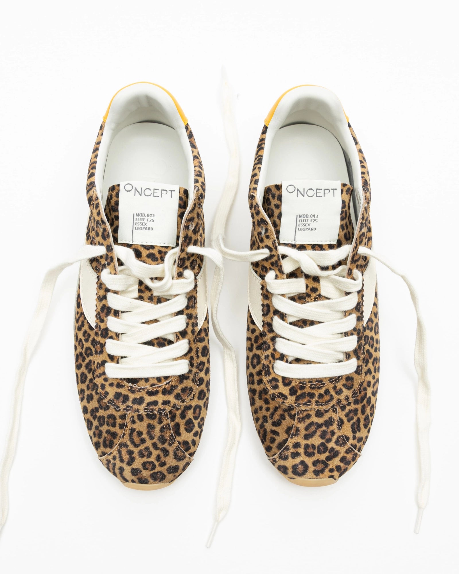 A pair of ultra-lightweight Essex Sneakers by ONCEPT featuring animal print, white laces and soles, shown from above on a plain white background. The tongues display "ONCEPT" and product details in black text.