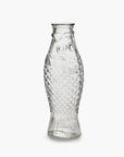 Clear glass carafe with scaled fish design and fins, by Serax, perfect for unique kitchen or dining decor.