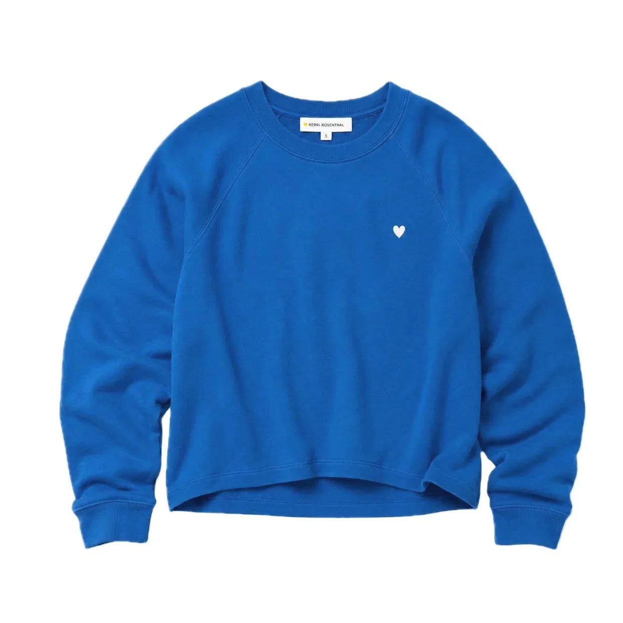 Bright blue sweatshirt with white heart, raglan sleeves, 100 cotton by Kerri Rosenthal for Bungalow Furniture &amp; Accessories.