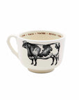 The Sir/Madam Grand Cup is a white ceramic animal cup with a black cow illustration on the side and "cow" written in several languages around the inner rim.