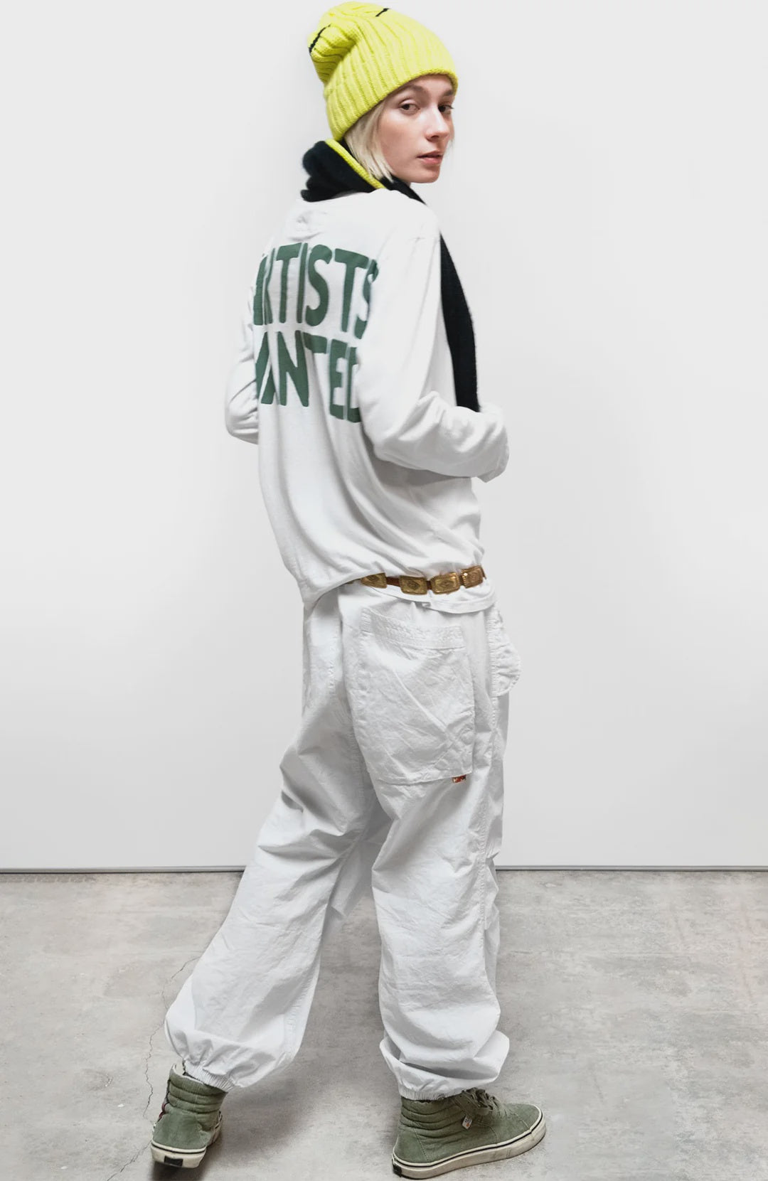 Free City Artistwanted long sleeve tee with bold Artists Wanted text on the back, casual style.