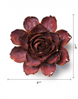 The Dewberry Camellia by Chive Ceramics features dark red, layered petals and is centered on a white background. Black measurement lines show this ceramic flower wall art measures 5 3/4 inches wide and tall—a bold statement for any room.