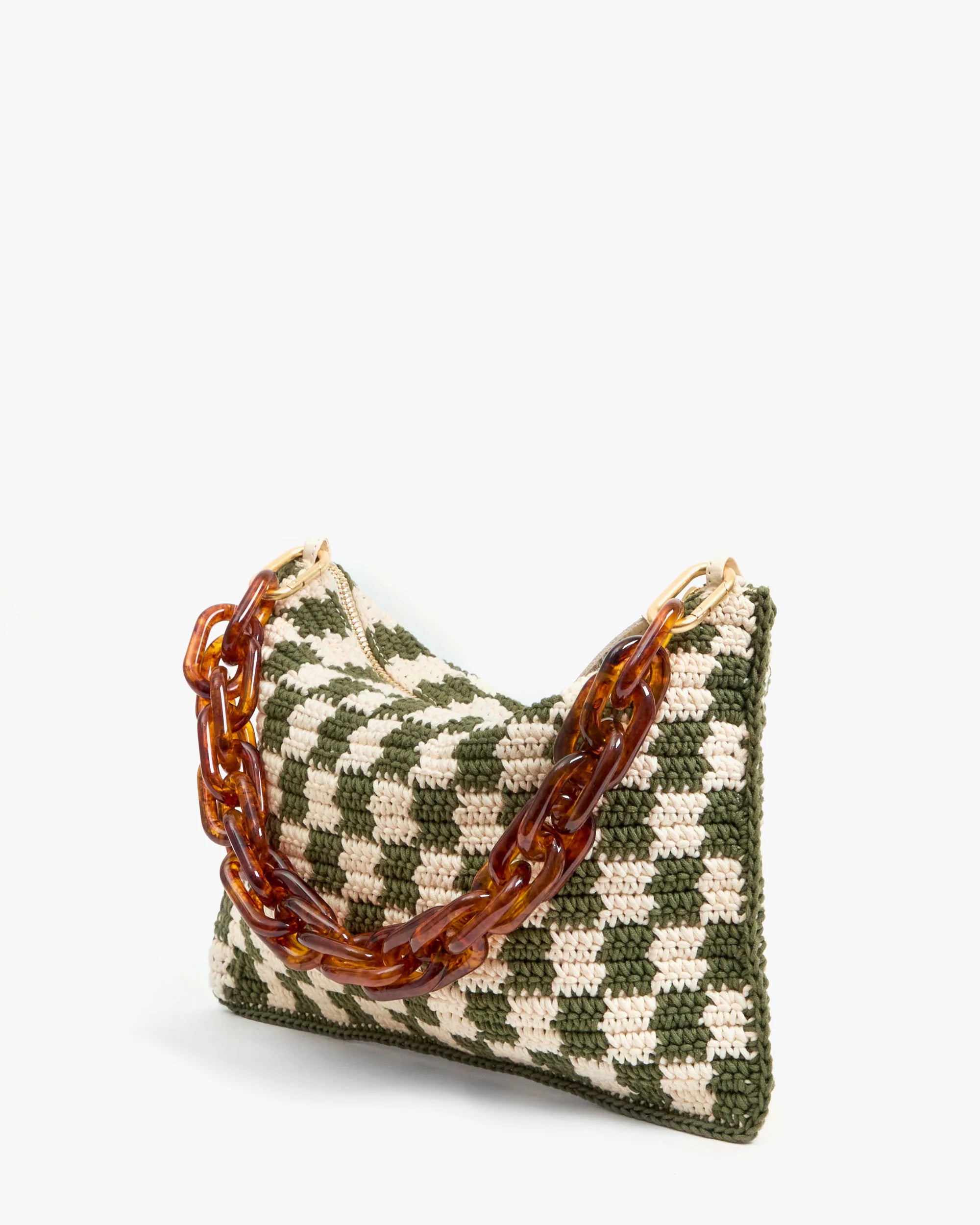 The Clare Vivier Flat Clutch W/Tabs is a green and cream checkered knit crossbody bag with a chunky amber chain handle, shown against a plain white background.