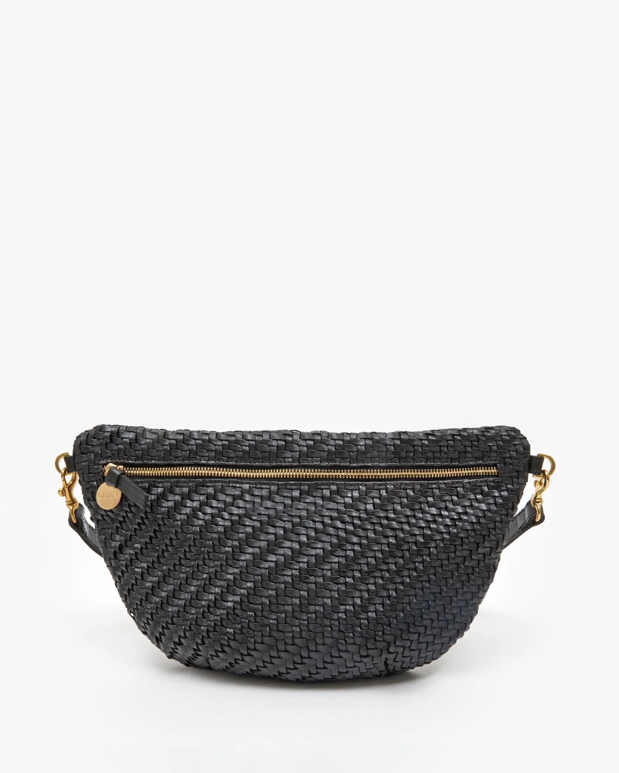 The Grande Fanny S25 by Clare Vivier is a black handwoven leather crossbody bag with gold zipper and hardware, an adjustable strap, shown against a plain white background.