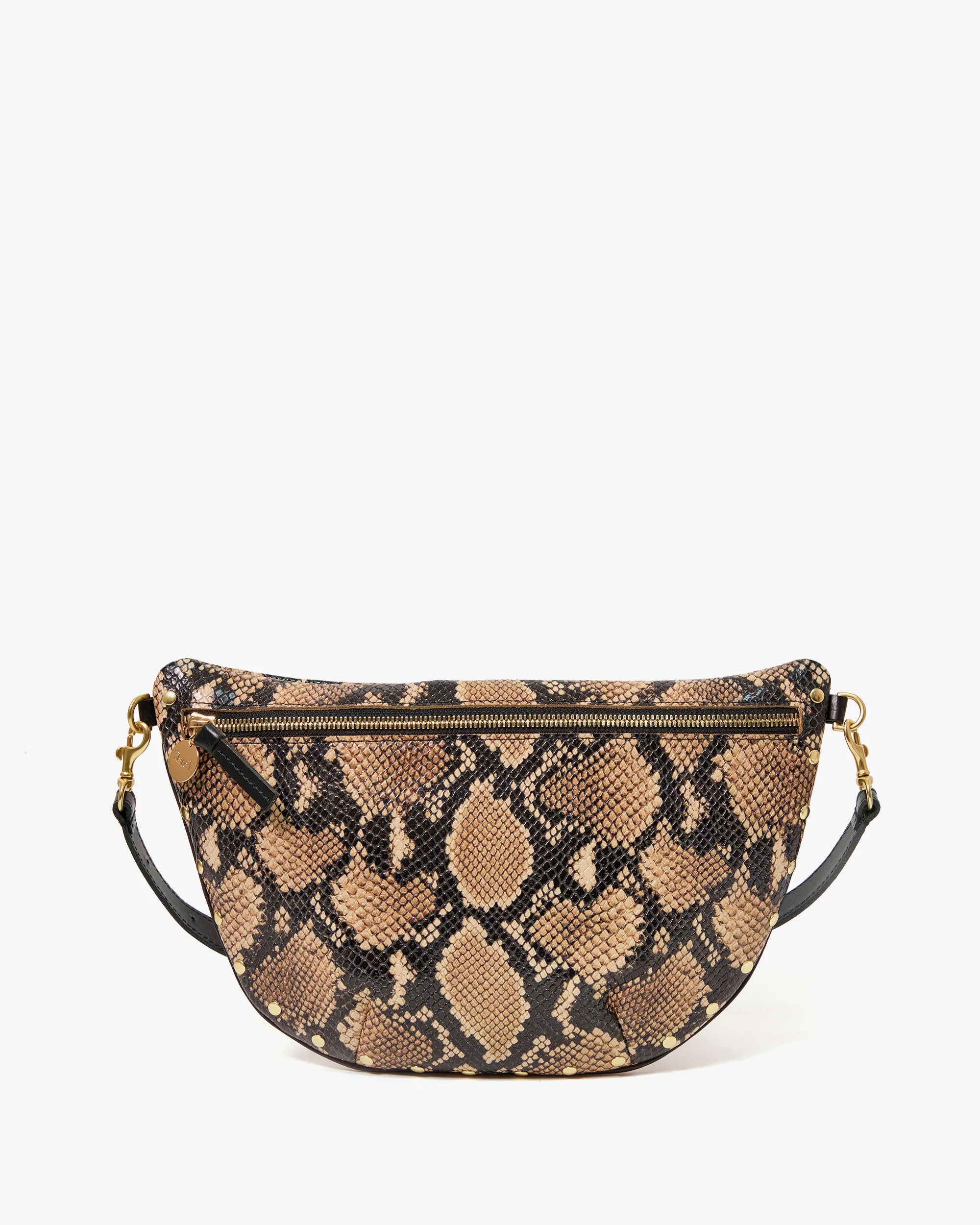 The Clare Vivier Grande Fanny S26 is a half-moon crossbody bag in brown and black snakeskin with a front zipper and black strap featuring gold hardware, shown against a white background.