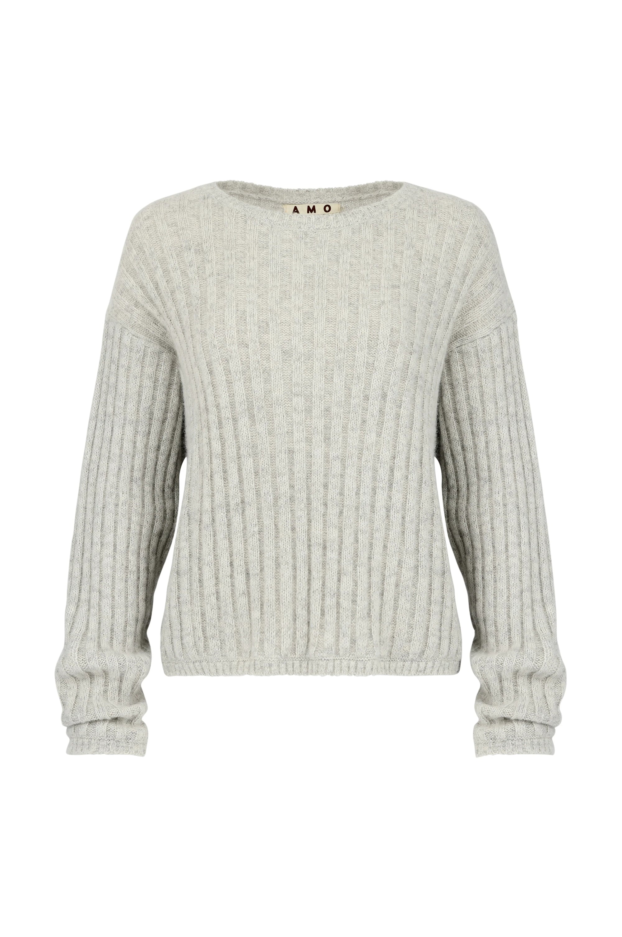The Hallie Sweater by AMO Denim is a light gray alpaca knit with long sleeves, a ribbed crew neck, and a relaxed boxy fit. Subtle vertical ribbing adds texture throughout the body and sleeves.