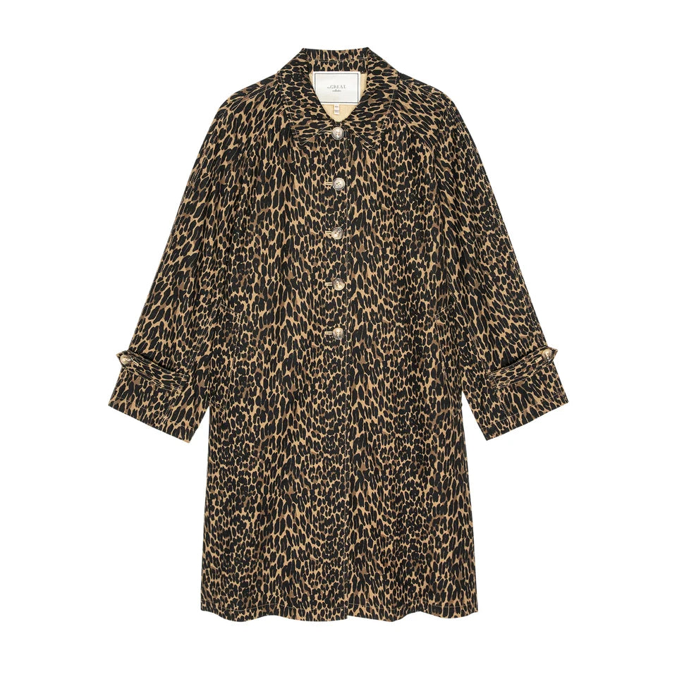Dark leopard print trench coat with buttons, wide sleeves, pockets, and A-line shape by The Great Inc.