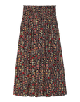 The Great Inc.'s The Canary Skirt is a midi-length cotton seersucker skirt with a black base and vibrant red, yellow, and green floral print. It features a smocked elastic waistband, pleated design, and comfortable pull-on style.