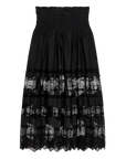 The Rosette Crochet Canary Skirt by The Great Inc. is black with a smocked waistband, sheer Victorian-style lace panels, and a scalloped lace hem.