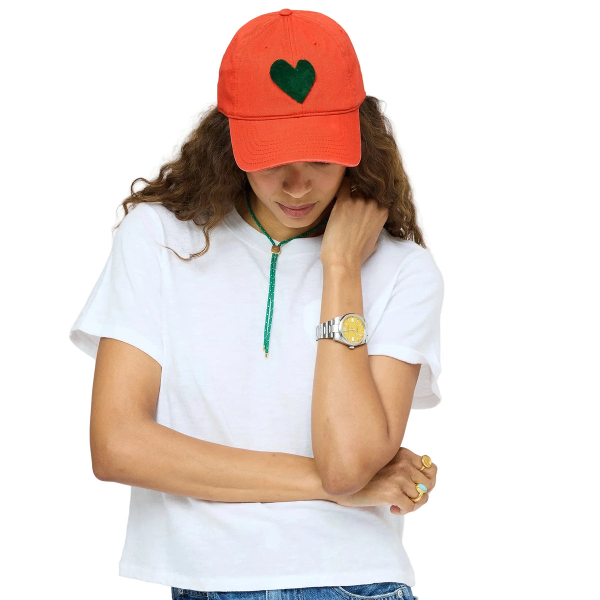 Red velvet KR Imperfect Heart Hat by Kerri Rosenthal, styled casually with a white tee and jeans.