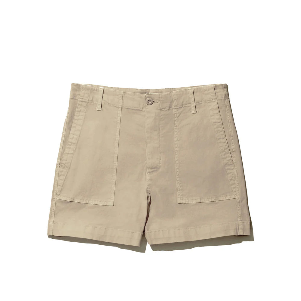 The City Short by Kule is crafted from premium Italian cotton in beige, featuring a button and zip closure, belt loops, and two large front pockets. Displayed laid flat against a white background.