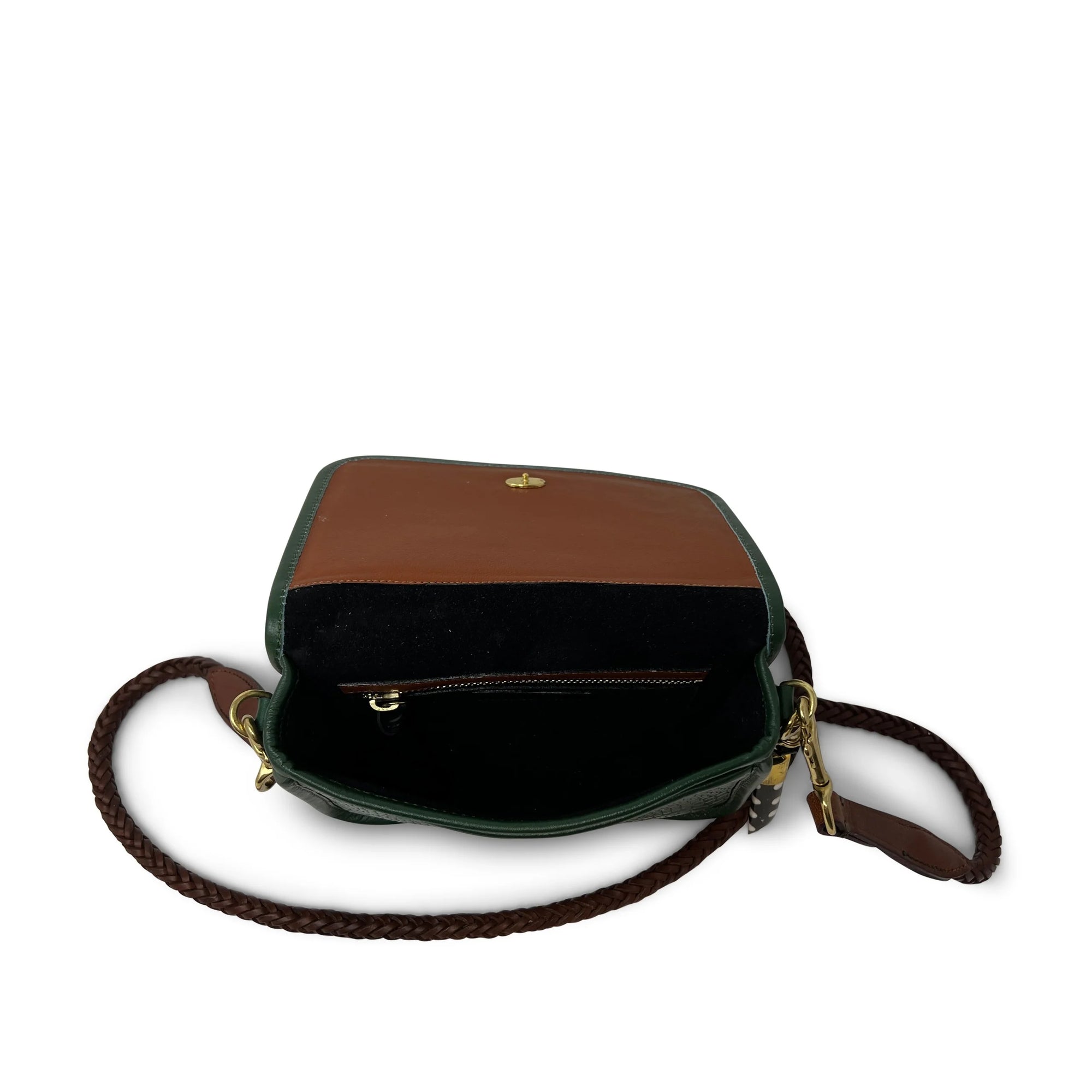 The Kempton & Co. Mini Mia Crossboy is a compact evening handbag with a braided strap, brown flap, black lining, internal zip pocket, and gold-tone hardware for added sophistication.