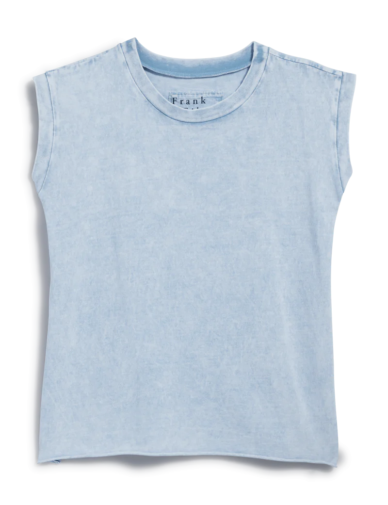 The Aiden Vint Muscle Tee by Frank & Eileen is a light blue, short-sleeved, crew neck top with a slightly faded look and boxy silhouette, shown laid flat on a white background.