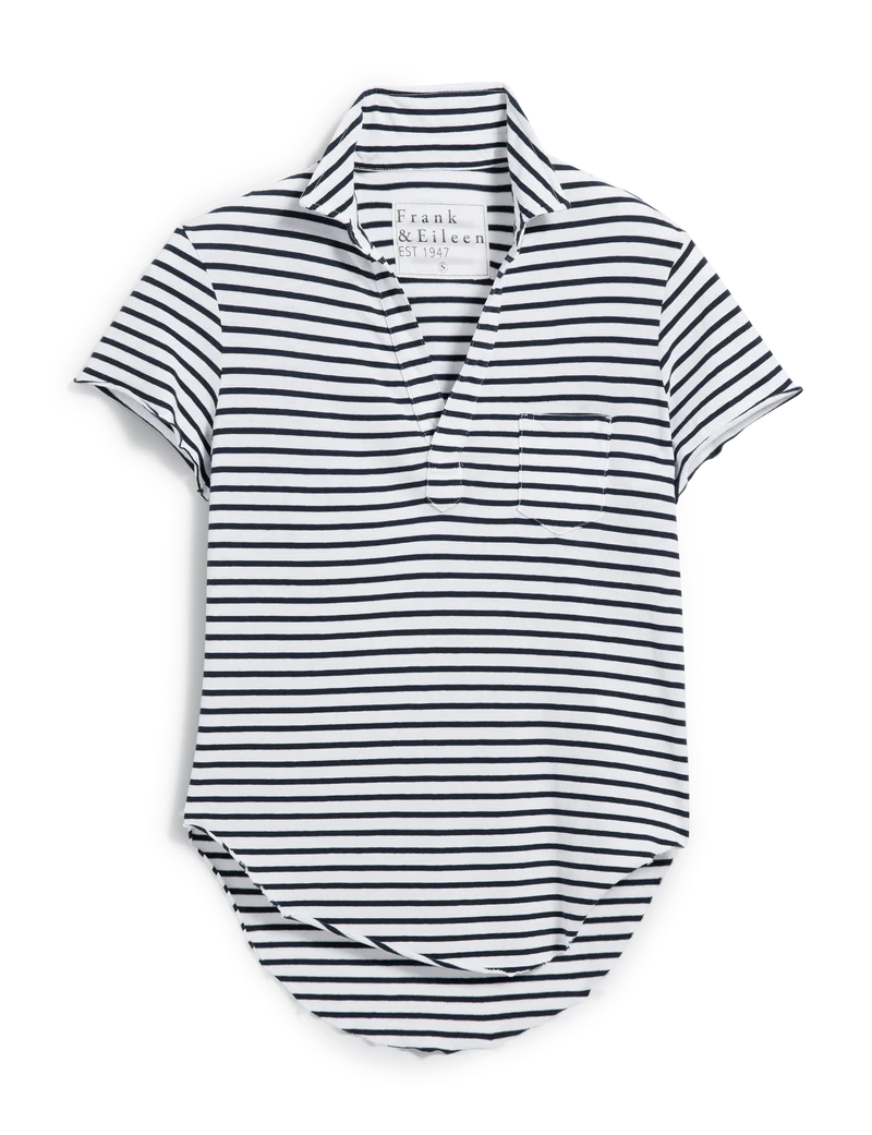 The Charlotte Perfect Polo by Frank & Eileen is a short-sleeved, collared Heritage Jersey shirt with black and white stripes, a single chest pocket, curved hem, and an inside "Frank & Eileen" label.