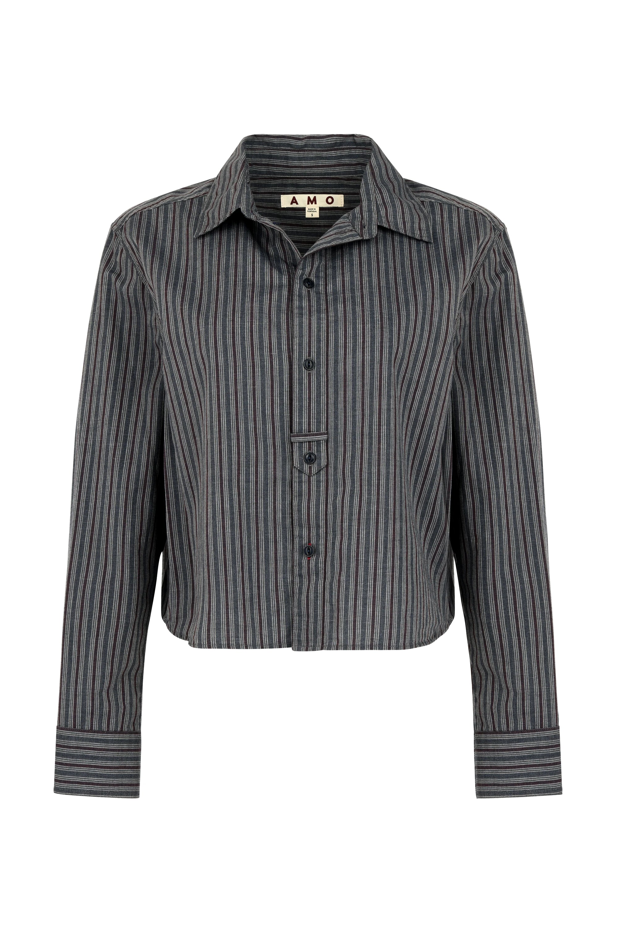 The Lena Shirt by AMO Denim is a relaxed-fit, long-sleeve button-up with vertical black and gray pinstripes, a fold-over collar, and a cropped hem. "AMO" is labeled inside the collar.