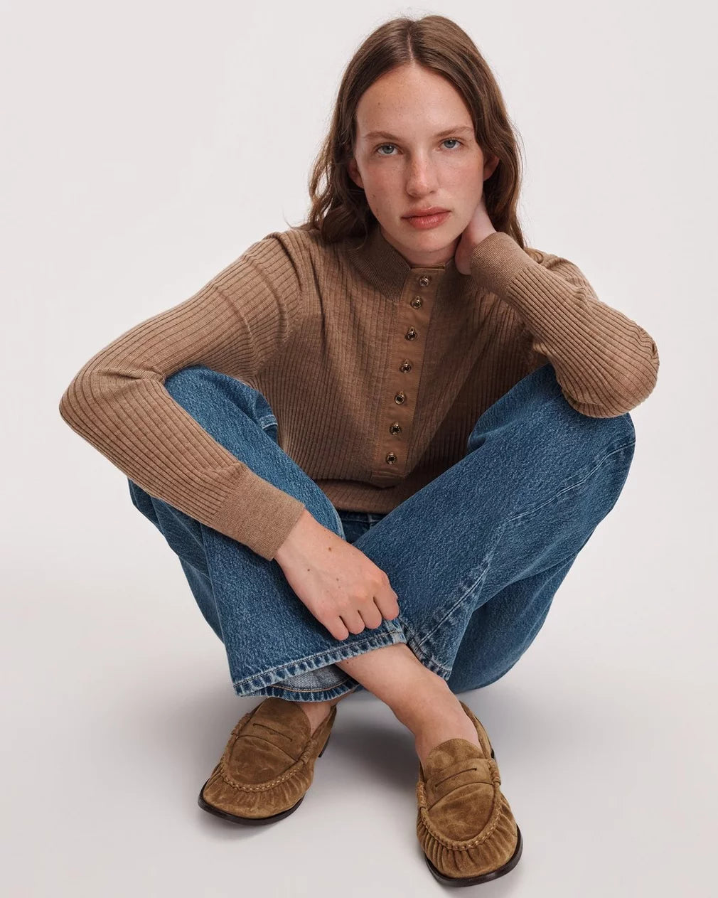 Rag &amp; Bone Lexi loafers in a casual setting, styled with jeans and a brown sweater for a relaxed, modern look.