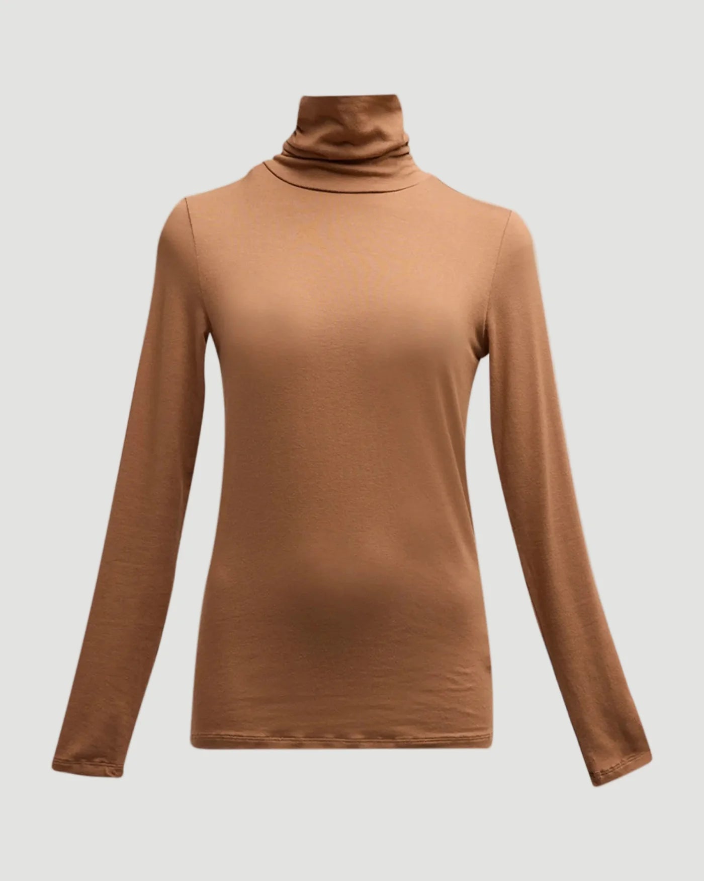 The Majestic Filatures Soft Touch L/S Turtleneck is a plain, light brown long sleeve shirt with a soft touch, shown against a white background.