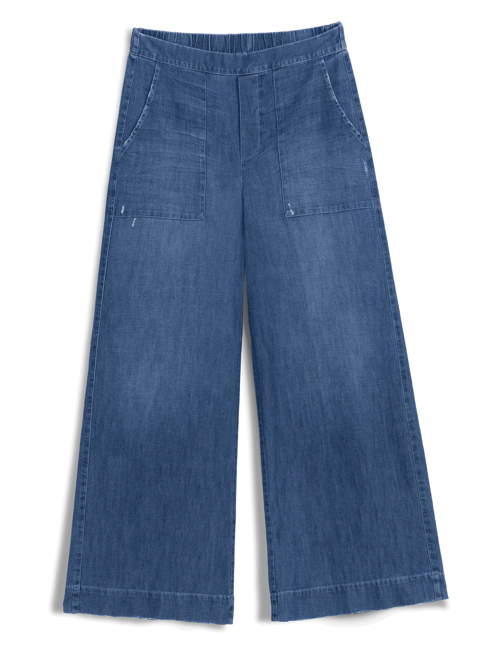 The Madeline Patch Pocket Pant by Frank & Eileen features wide-leg, cropped indigo denim, large front patch pockets, an elastic waistband, and a relaxed fit, shown laid flat on a white background.