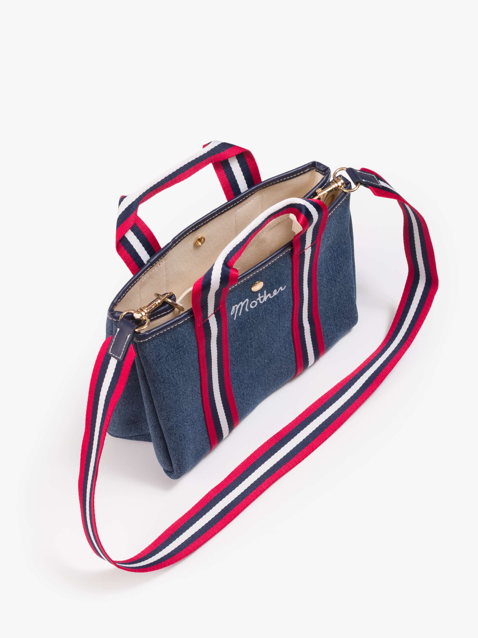 Denim tote with red, white, and blue strap and Mother embroidery on front by Mother.
