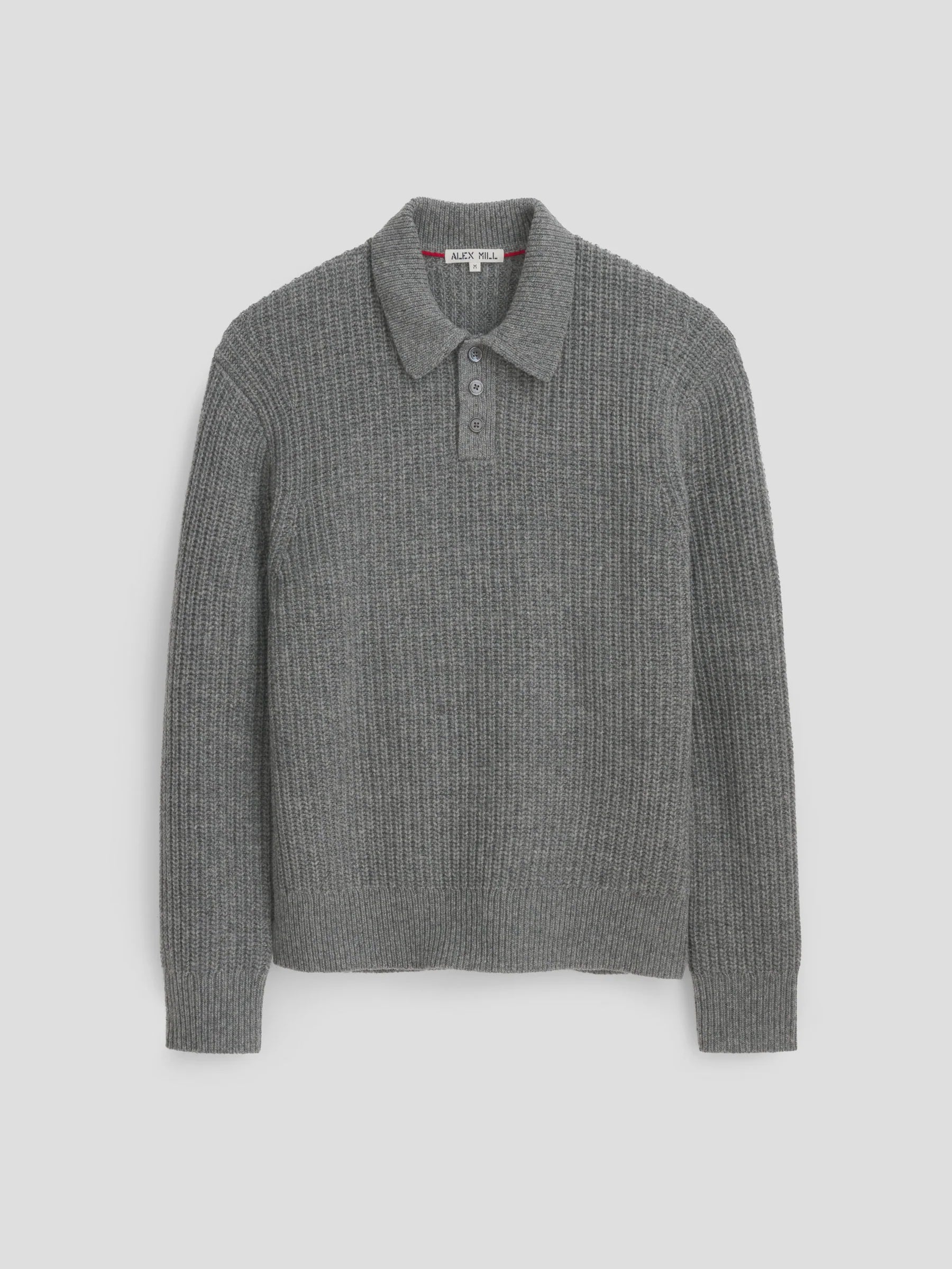 The Highland Collared Sweater by Alex Mill is a gray, long-sleeve sweater made from chunky yarn, featuring ribbed texture, a collar, and three shell buttons down the front. It is showcased against a plain white background.