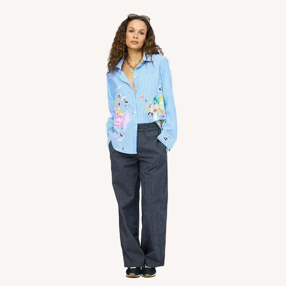 Mia Happimess Studio Shirt by Kerri Rosenthal styled with dark wide-leg pants and sneakers, casual chic look.