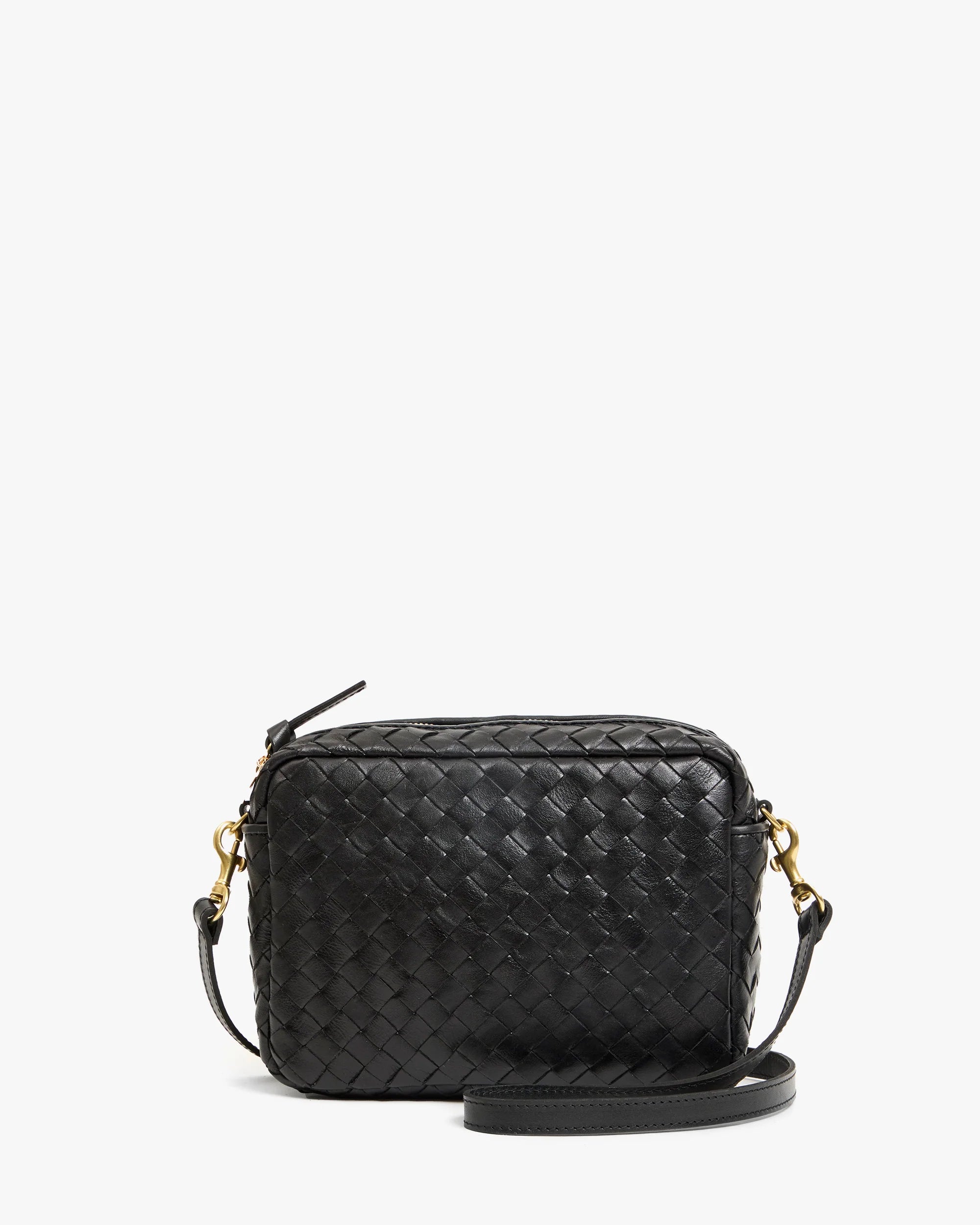 The Clare Vivier Midi Sac S25 is a small black handwoven leather crossbody with gold-tone hardware, an adjustable strap, and a rectangular shape, shown against a plain white background.