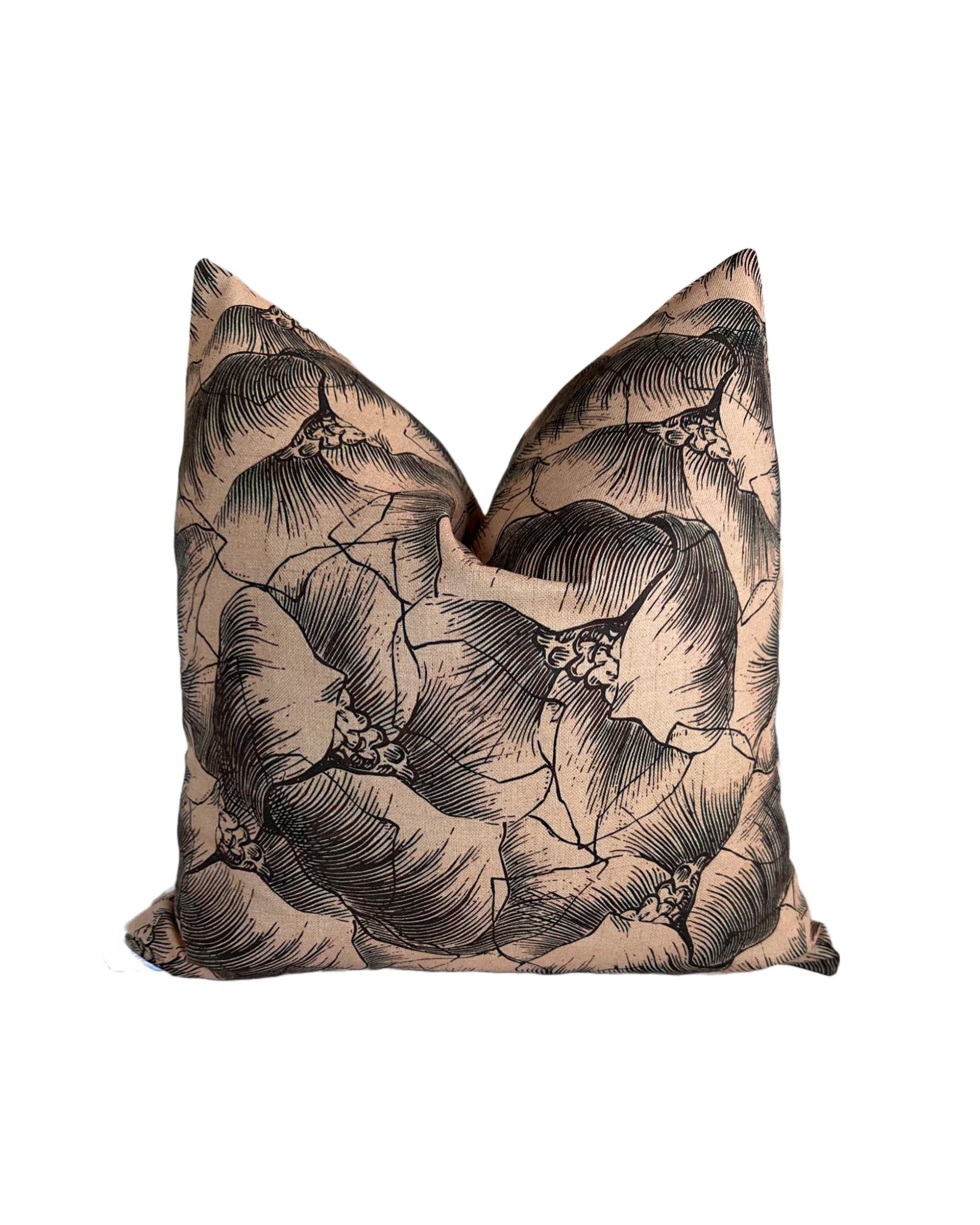 The Milo Pillow 22x22 by Rennah Collective features a beige background with bold black floral line art and large overlapping flowers on a soft polyester-linen cover.