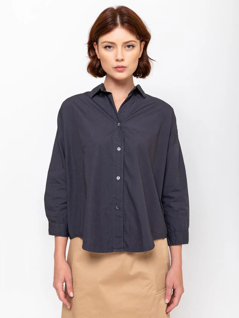 Monday12 Zoe Shirt in Slate and beige skirt modeled against a white background, modern casual style.