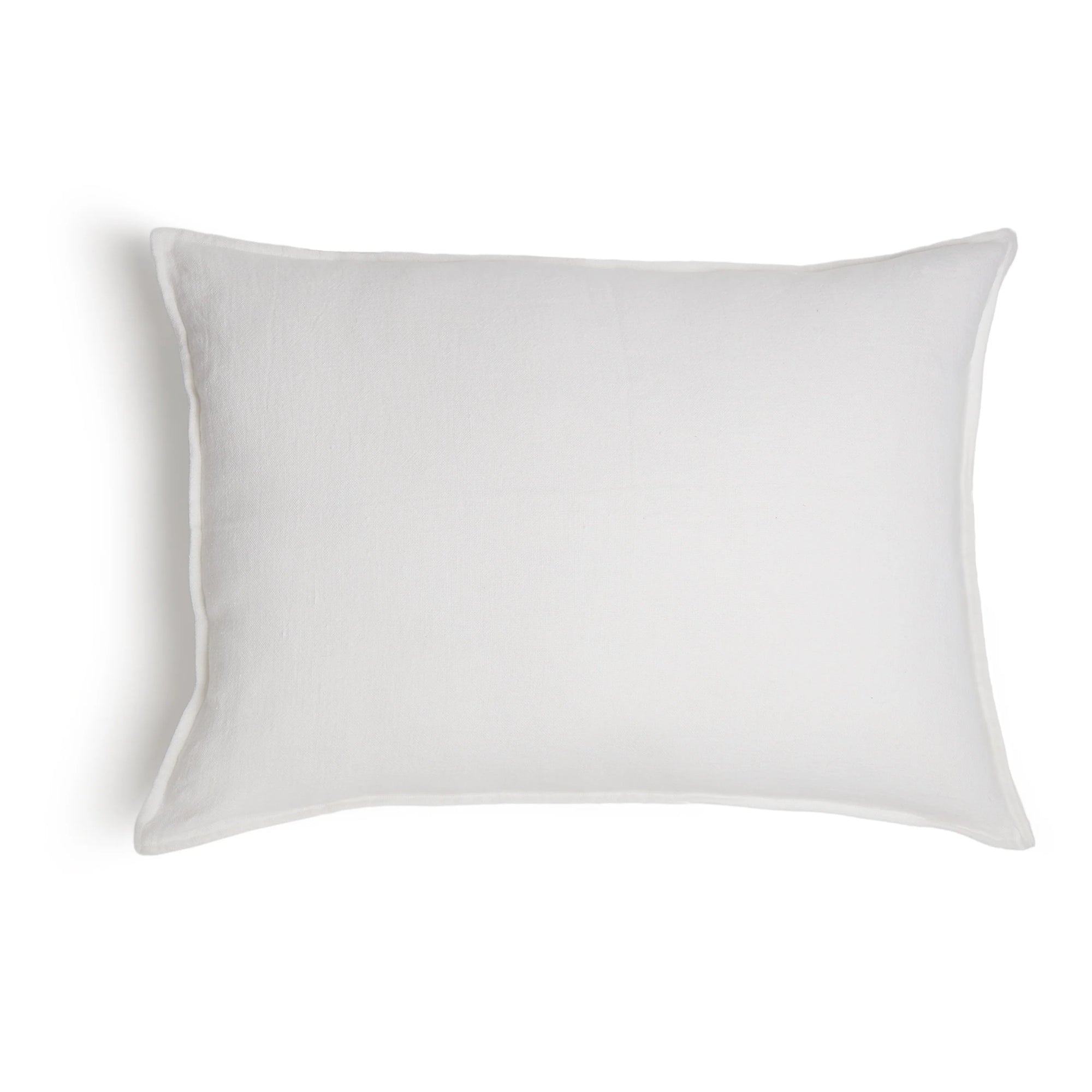 The Montauk Big Pillow 28x36 by POM POM is a rectangular white pillow made from heavyweight linen with a smooth, plain surface and gently curved edges, displayed against a white background.